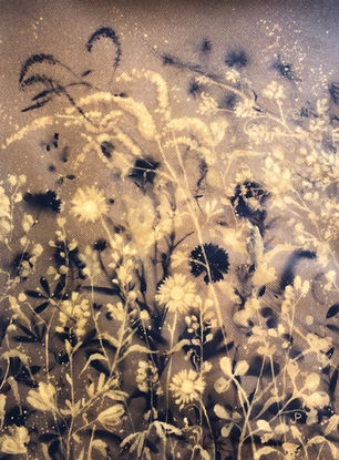 bleach painting of texas wildflowers appearing in gold and black 