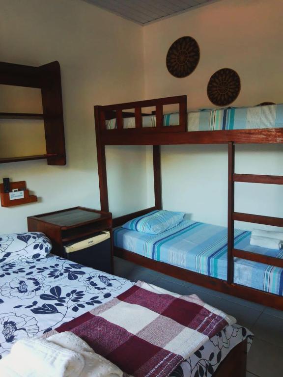 estalagem sol de boipeba quarto camas