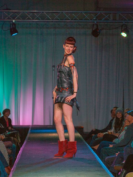 Repurposed couture from bicycle inner tubes and curtains.