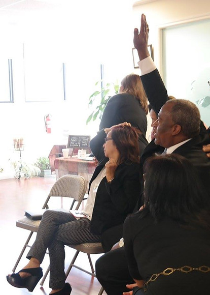 Teenage Students Raising Hands
