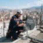 Outdoor photography of a technician installing a satellite dish on a city rooftop. The technician is focused on the task with an urban skyline in the background.