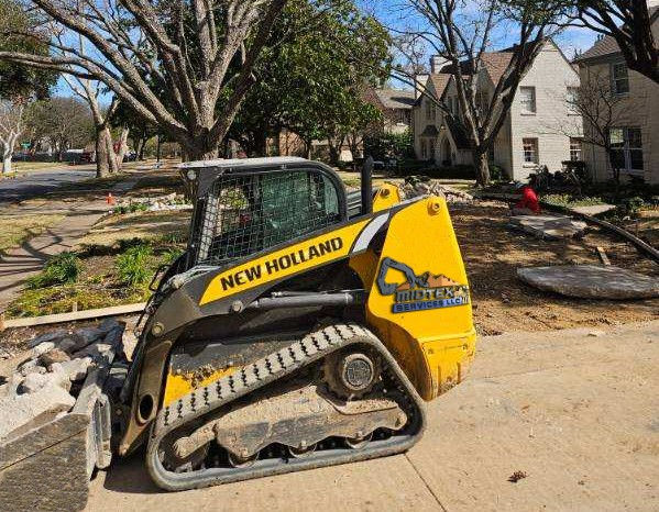 excavator hauling concrete