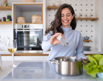 woman-preparing-meal-kitchen.jpeg