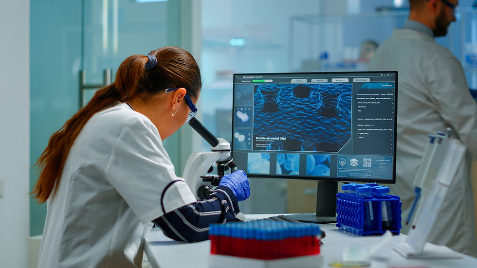 biotechnology-scientist-researching-laboratory-using-microscope-typing-pc-chemist-examinin