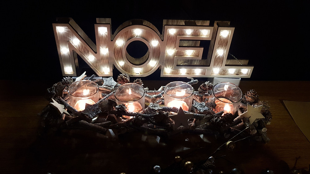 Noel Christmas decoration with lights and candles