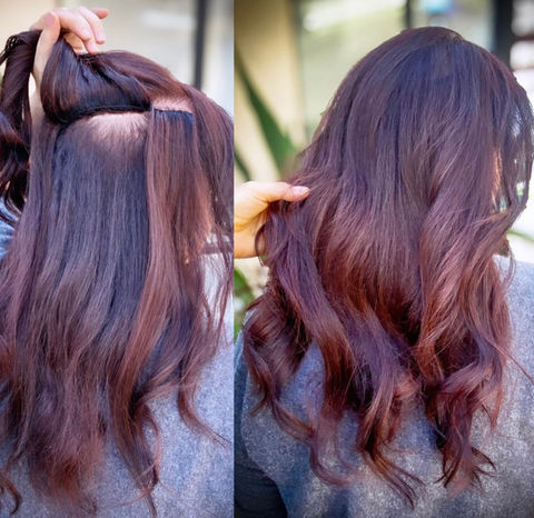 Image of woman with clip in hair extensions by Hair by Danielle