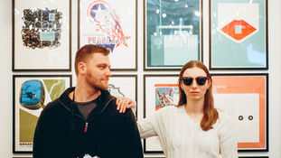 Wes Anderson inspired engagement photos on film - dive bar, record collection, and coffee shop
