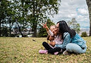 mother and daughter with Down Syndrome hugging