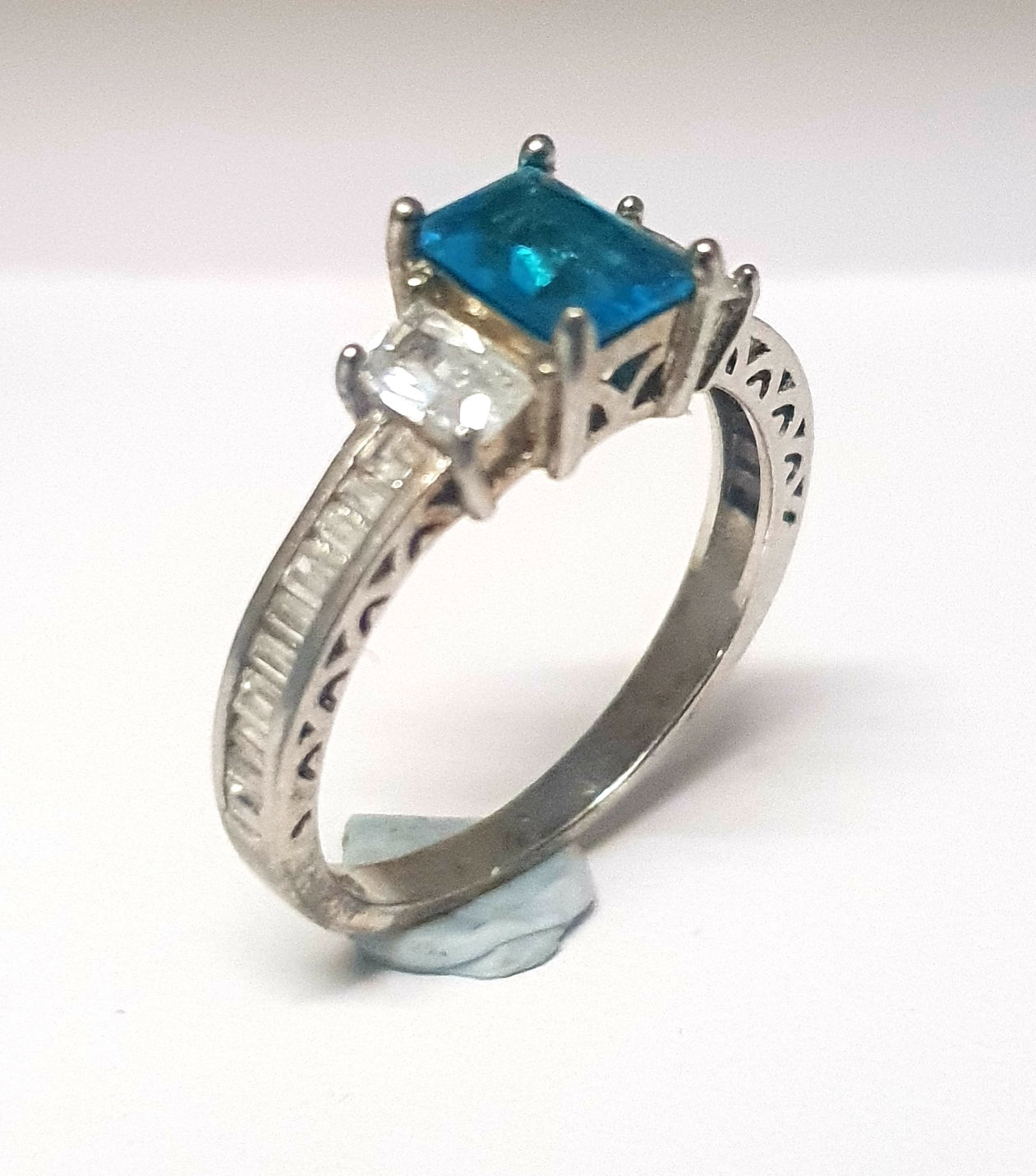 Intense Aquamarine & CZ set on a silver ring.