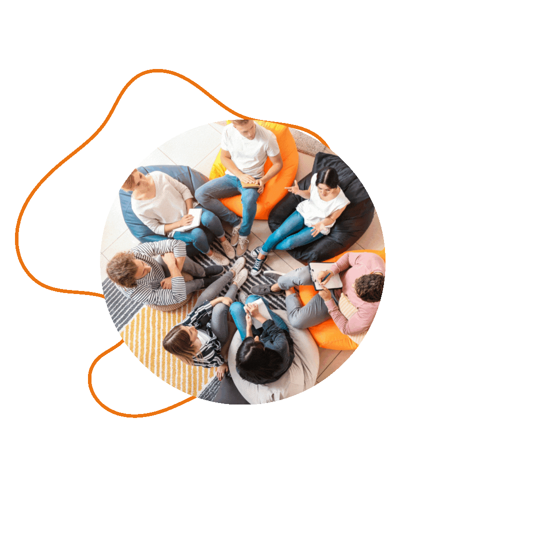 A group of people meeting for treatment