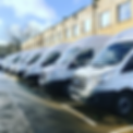8edge a line of luton vans parked up side by side - Quattro Logistics