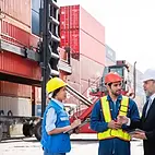 Port-workers-discussing-port-operations-management-software-1024x576.webp
