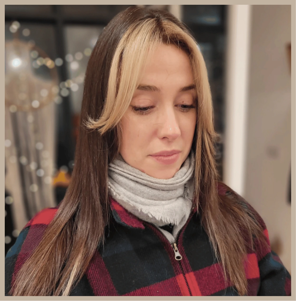 Blonde face framing pieces by Sara Styles Hair in Bethnal Green