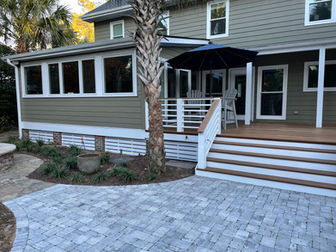 House back porch with stone patio
