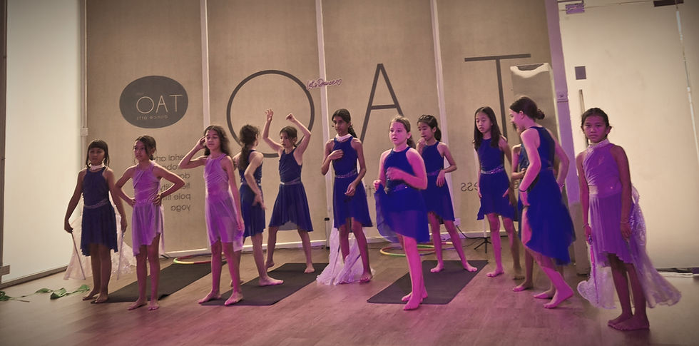 Children dancing in an annual showcase at Tao Dance Arts