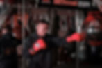 male boxer punching bag