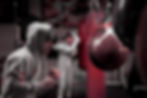 male athlete training with punching bag