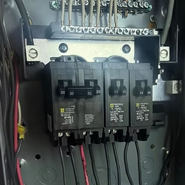 Close-up view of Square D circuit breakers and professional branch circuit wiring inside a new electrical panel in Sonoma County