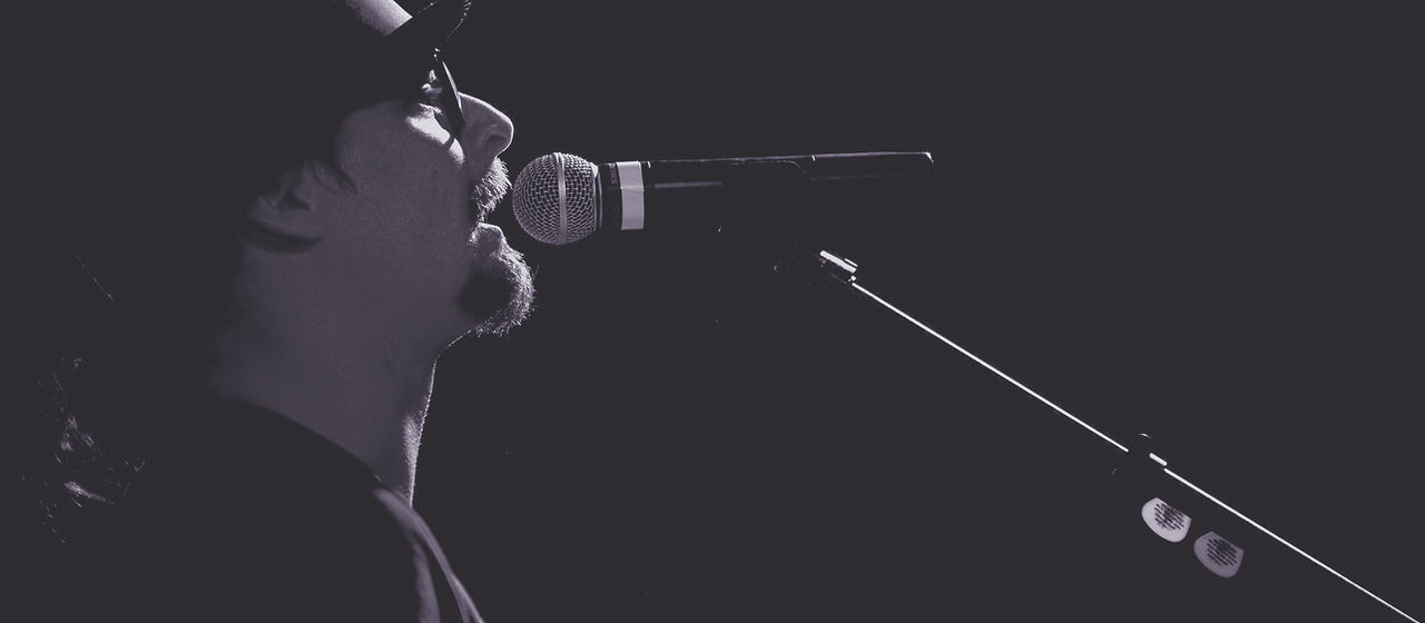 Singer Wearing Hat