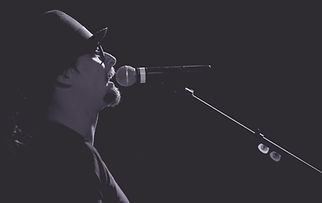 Singer Wearing Hat