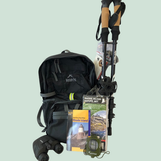 A hiking backpack, poles, binoculars, compass, and guidebooks.