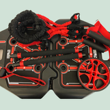 A red and black compact portable home gym.