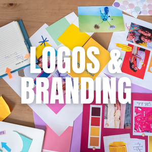 Creative workspace with notebooks and color swatches for branding design.