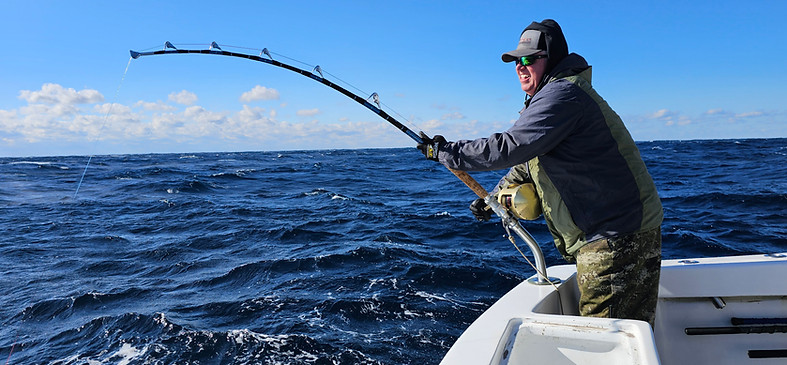 Angler Ryan Cain crankin on em.jpg