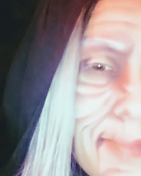 Close-up of a woman's face with Halloween makeup