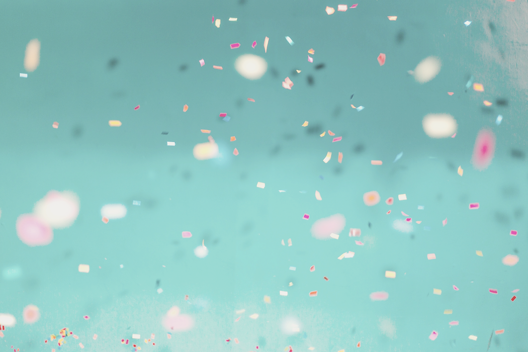 Colorful confetti falling down with a teal background_edited_edited_edited_edited.png