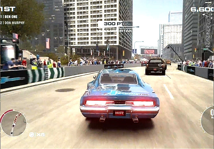 Thumbnail: Blue race car on a city street track in a video game, seen from behind with other cars ahead.