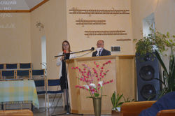 JOE PREACHING, KATE TRANSLATING