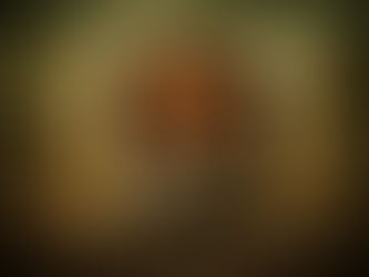 A statue of a human face with a brain inside a cage