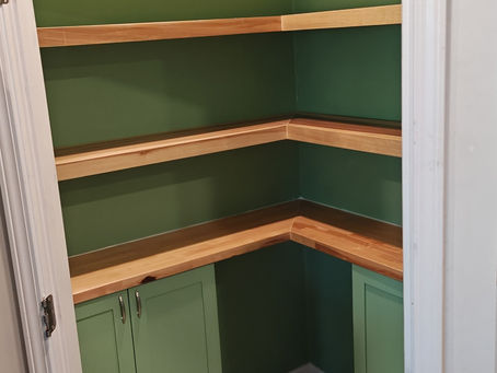 Pantry with Floating Shelves and Custom Cabinets