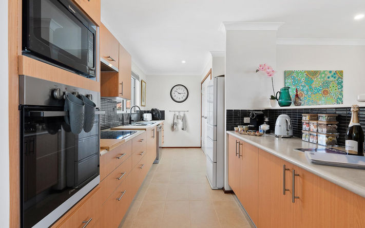 Fully equipped kitchen with ocean views.