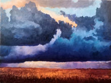 Dark, ominous storm clouds backlit by the sun, loom over fields of gold.