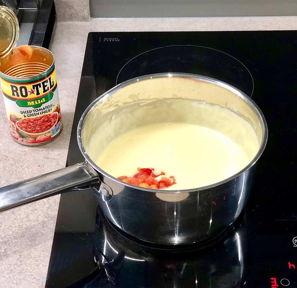 Melted cheese with Ro-Tel diced tomatoes and green chilies