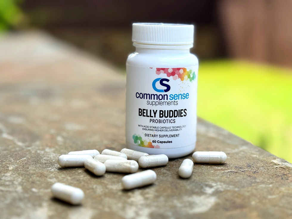 Close-up view of a probiotic supplement bottle with capsules spilling out