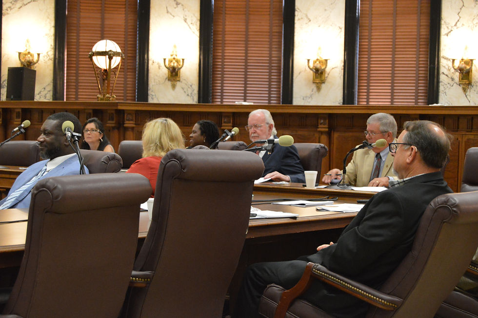 Members of the Senate Agriculture Committee, along with a few members of the House Agriculture Committee, listen those testifying during Tuesday's hearing. Photo by Steve Wilson