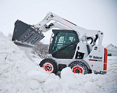 Bobcat Skid Steer removing snow Joplin