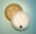 Molded cup lids made with Fiberdom's Duranova™ and Kiefel's dry forming technology
