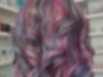 Custom rainbow hair color by Cam Yale, Denver vivid color specialist at Fleur Salon, designed for expressive personal style.