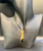 Hand made gold and black glass pendant