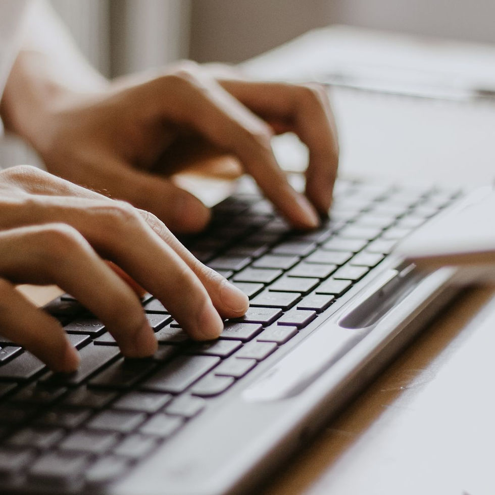 A digital marketing quickly types headlines to engage your audience.