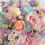 Thumbnail: Bouquet of pink roses, peach roses, purple and yellow carnations, blue and pink hydrangea, and daisies