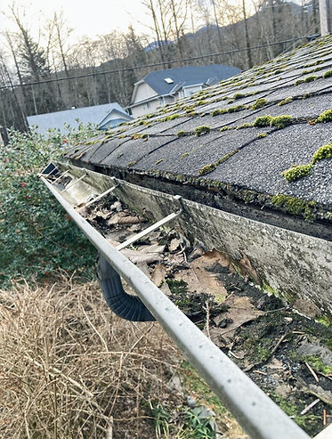 Damaged gutter due to negligence , dirty eavestrough, Squamish, BC, Canada