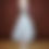 Thumbnail: Handmade decorative doll dressed on white organza skirt and blouse carrying a bunch of delicate colorful ribbons, full body (front)