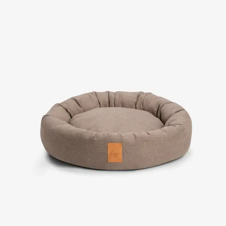Beige runder Hundekorb mit Lederdetail