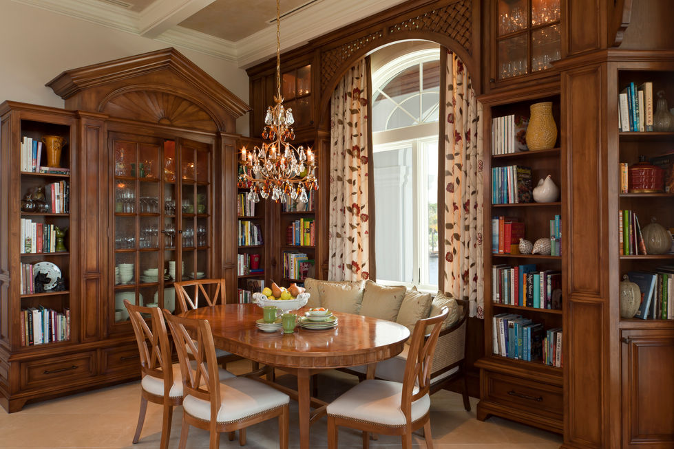Casement windows in a large wooden library. 