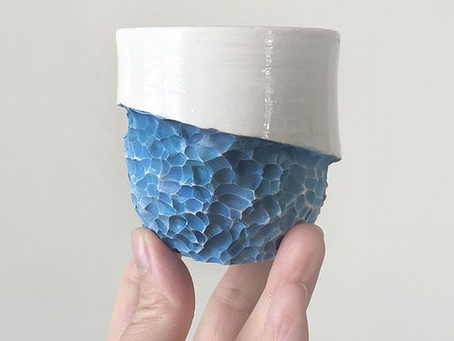 Unique coffee or tea cup, zen idea, half full
